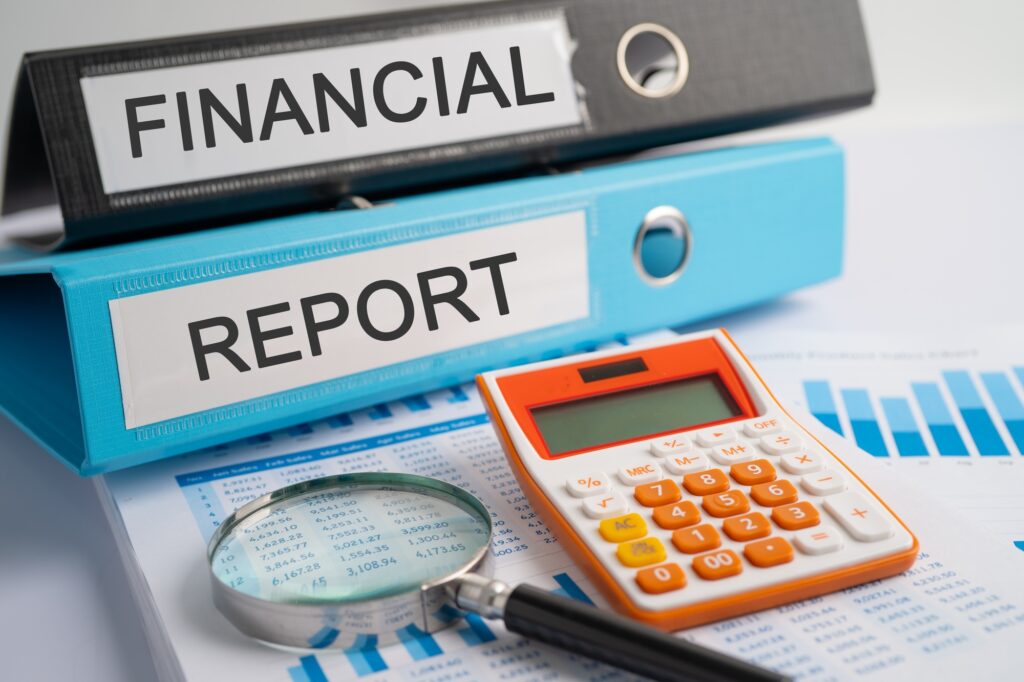 Financial, Report. Binder data finance report business with graph analysis in office.